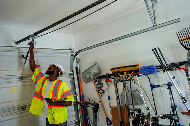 Professional Garage Door Panel Replacement technician working in Satsuma, AL